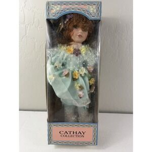 VTG Cathay Collection porcelain doll, blue flower dress, red hair, IN BOX